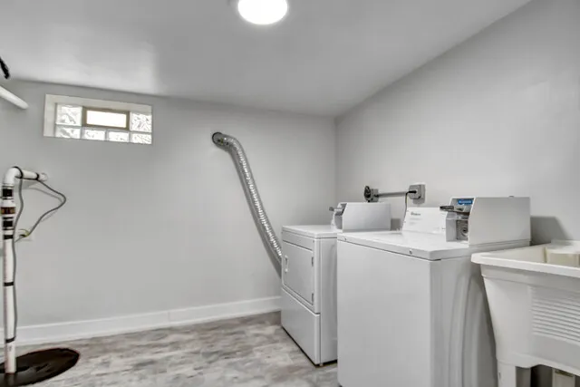 a utility room with dryer and washer