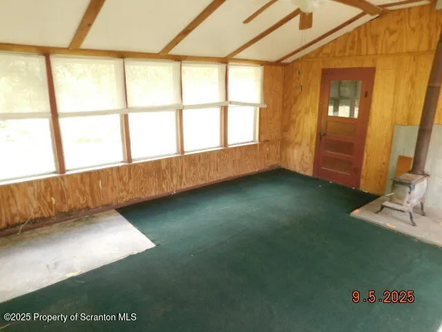 a view of an empty room and window