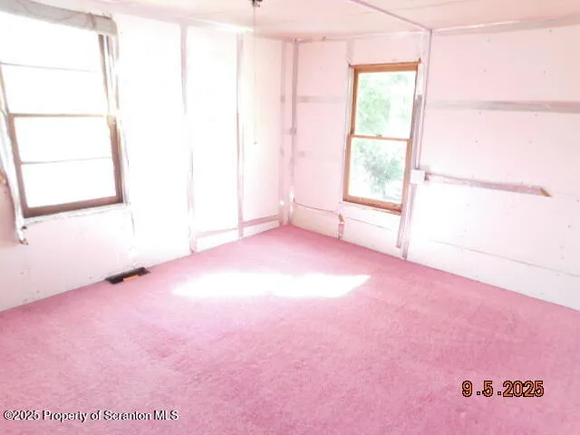 a view of an entryway with staircase