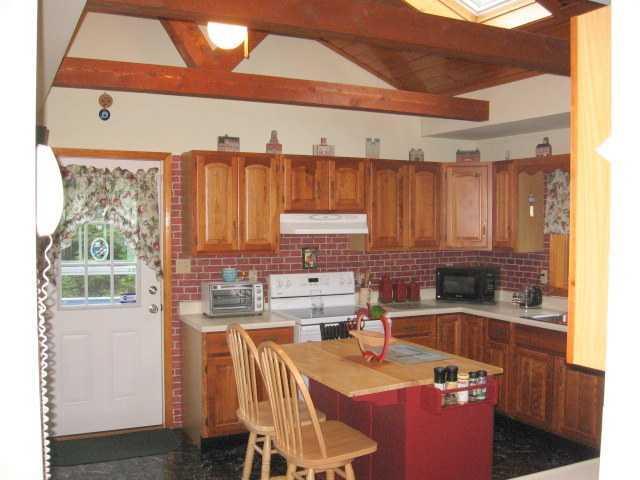 197 Location Road Belgrade, ME 04917 - Photo 5 of 17 Kitchen. with appliances, center...
