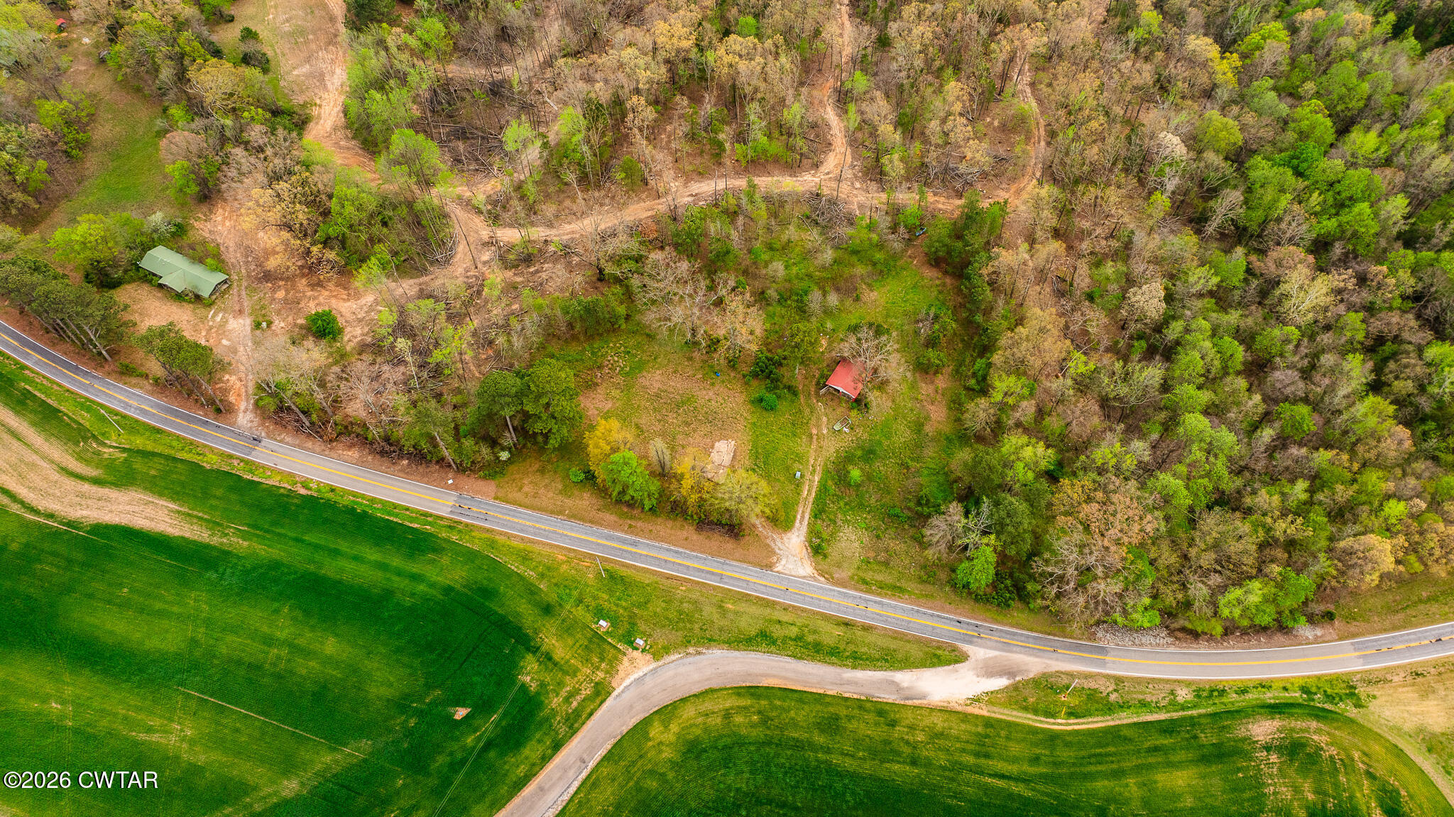 6930 Highway 423 McKenzie, TN 38201 - Photo 3 of 8 a view of a yard with an outdoor seating