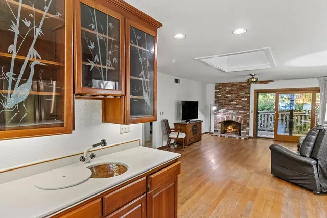 a view of living room with furniture and flat screen tv