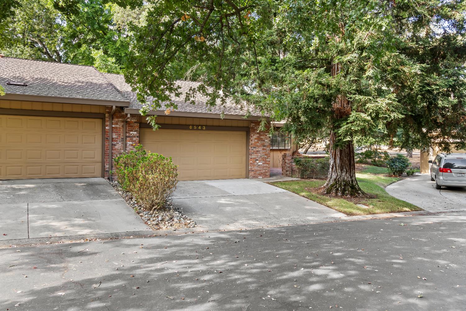 6543 Crosswoods Circle Citrus Heights, CA 95621 - Photo 2 of 33 a front view of a house with a yard and garage