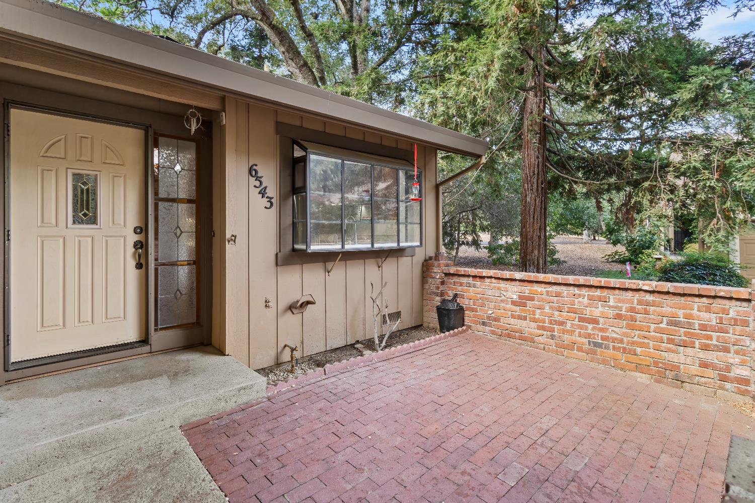 6543 Crosswoods Circle Citrus Heights, CA 95621 - Photo 6 of 33 a view of backyard with large tree