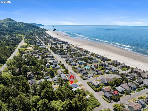 an aerial view of beach and ocean