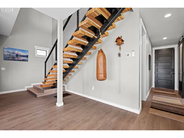 a kitchen with a sink and a refrigerator