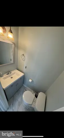 a view of a hardwood & staircase