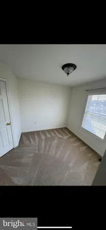 a view of a livingroom with an empty space