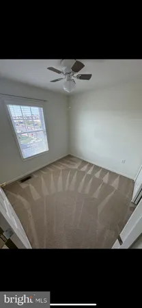 a view of a lake with a yard