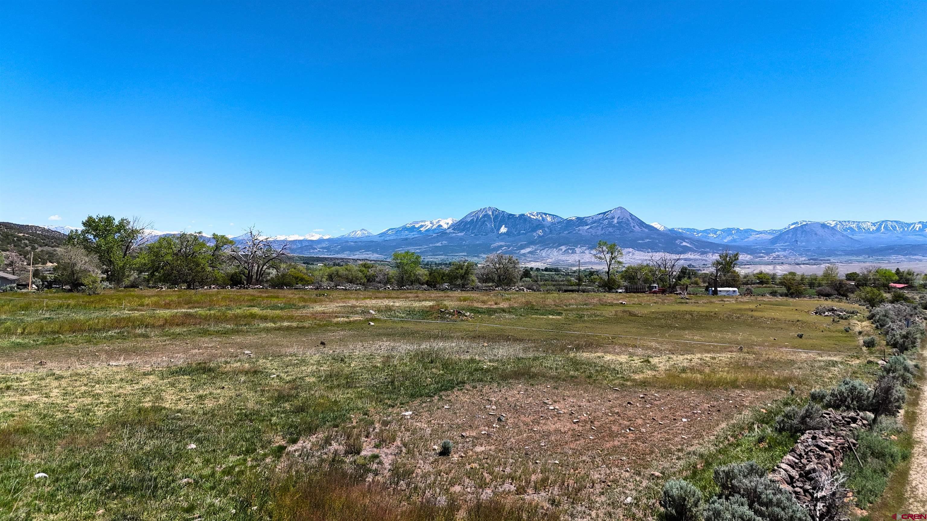 11306 3150th Road Hotchkiss, CO 81419 - Photo 1 of 13 a view of lake with mountain view
