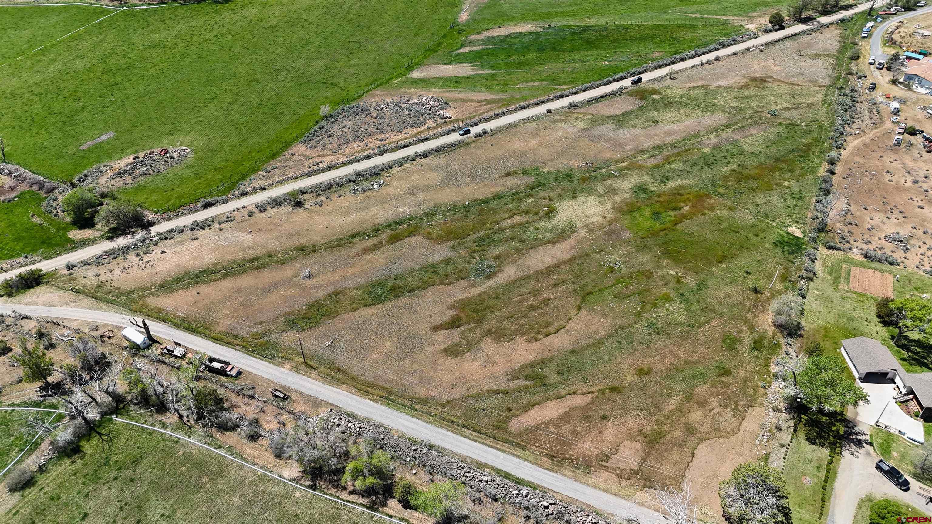 11306 3150th Road Hotchkiss, CO 81419 - Photo 12 of 13 a view of a yard with street