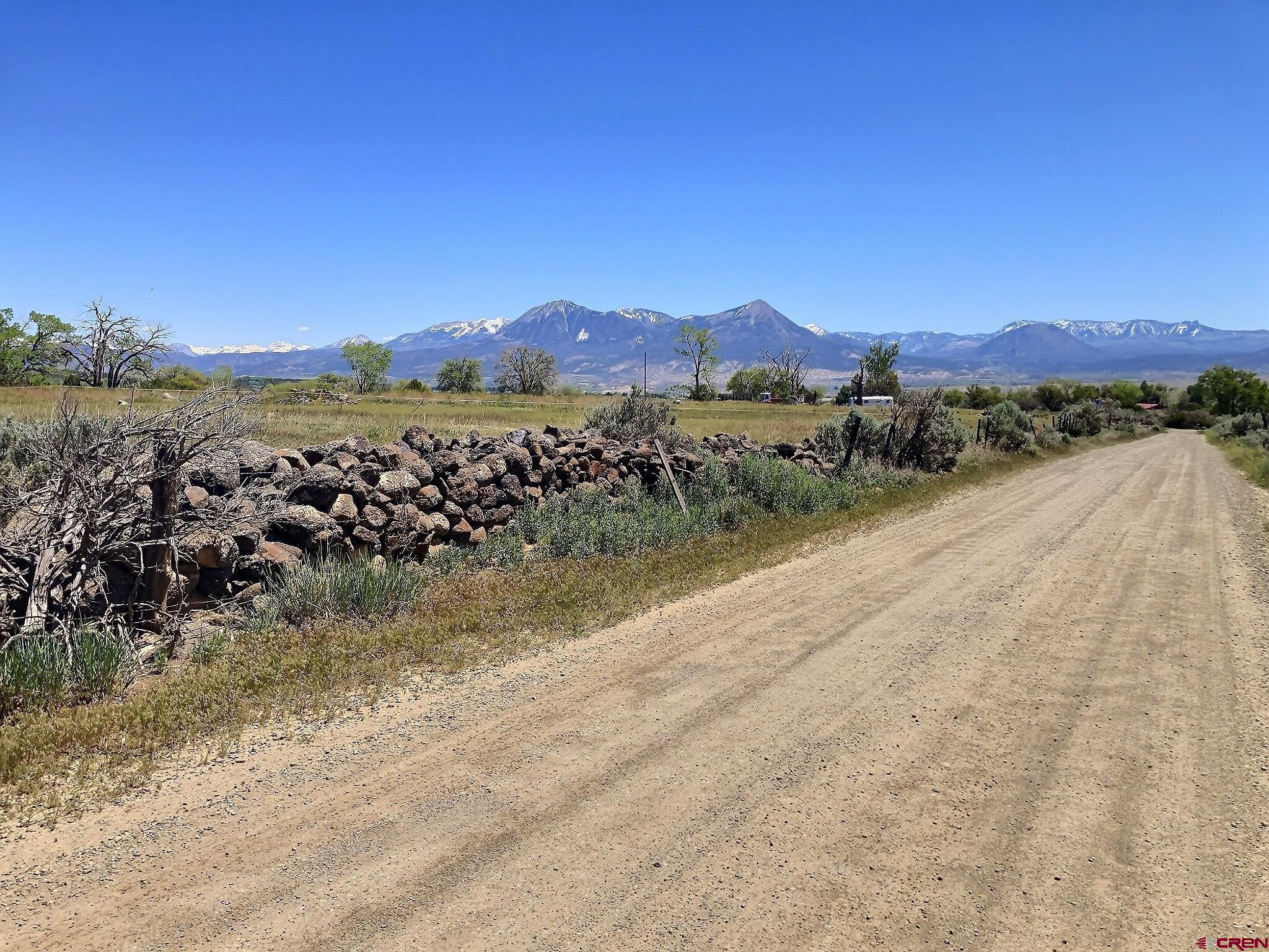 11306 3150th Road Hotchkiss, CO 81419 - Photo 2 of 13 a view of lake with mountain