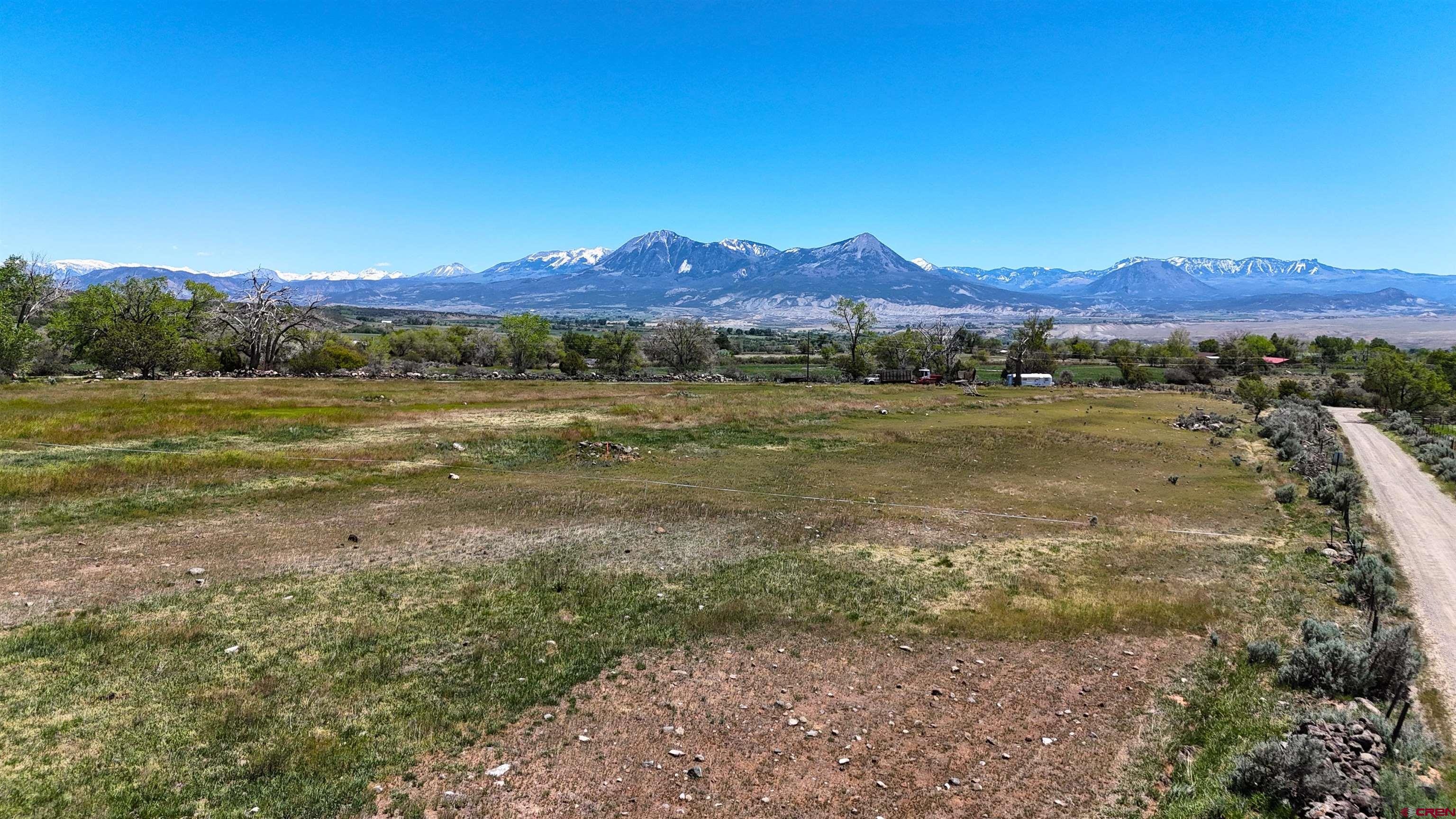 11306 3150th Road Hotchkiss, CO 81419 - Photo 6 of 13 a view of an outdoor space with mountain view