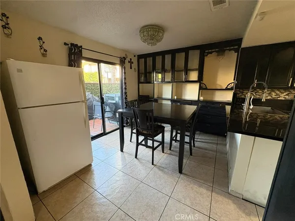 a view of a dining area with furniture window and outside view