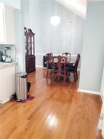 a view of a dining room with furniture