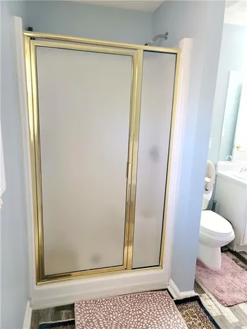 a bathroom with a sink and a toilet