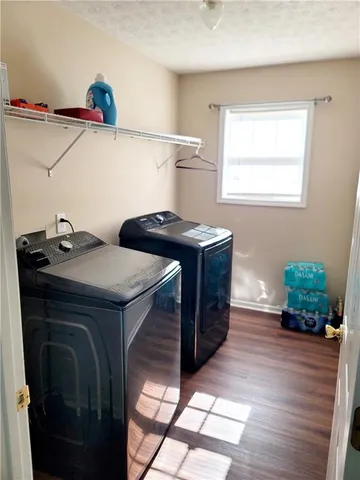 a utility room with dryer and washer