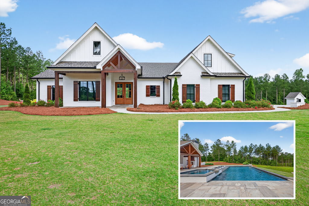 a front view of a house with garden
