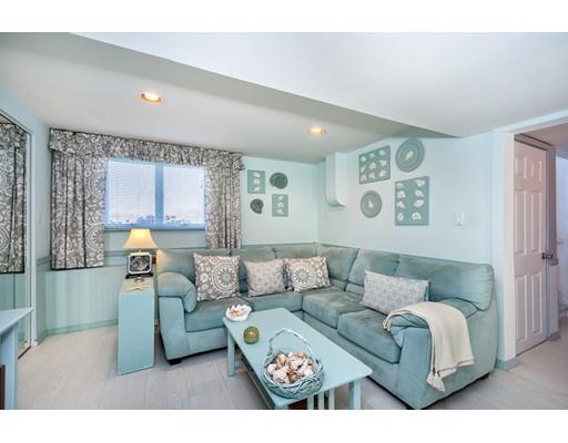 159 Beach Avenue Hull, MA 02045 - Photo 18 of 28 a living room with furniture and painting on the wall