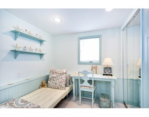 159 Beach Avenue Hull, MA 02045 - Photo 19 of 28 a living room with furniture and a table