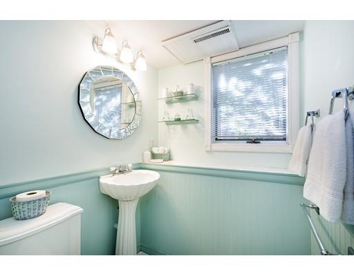 159 Beach Avenue Hull, MA 02045 - Photo 20 of 28 a bathroom with a sink mirror and a window