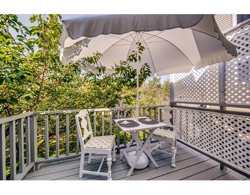 159 Beach Avenue Hull, MA 02045 - Photo 8 of 28 a balcony with table and chairs
