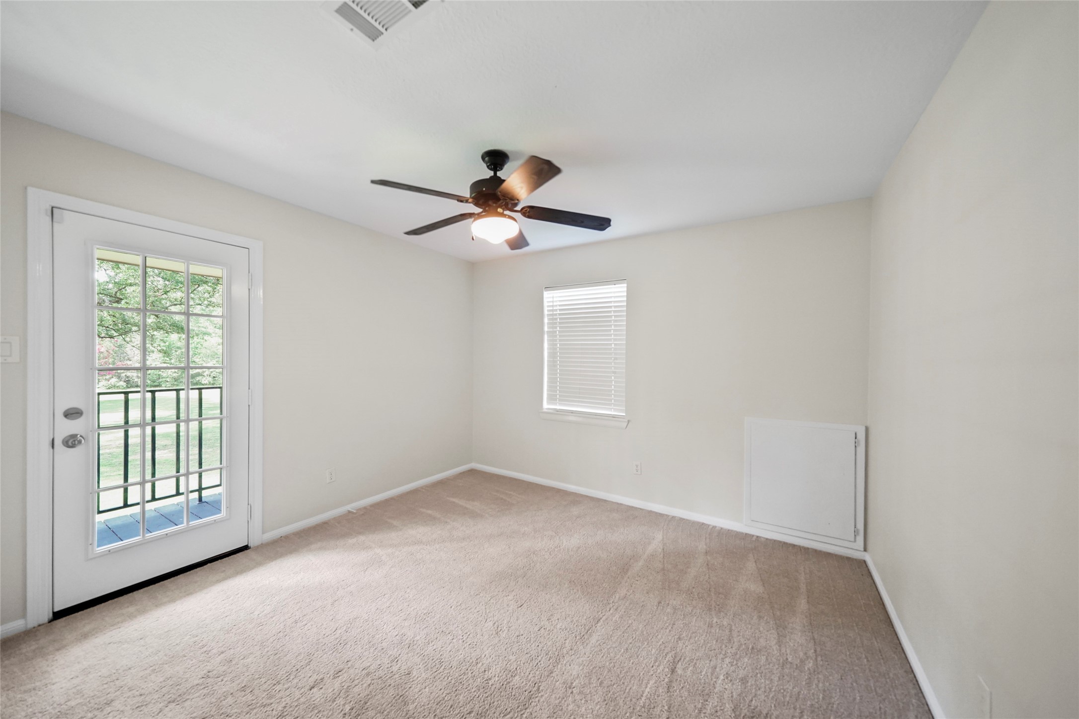 14443 Lyric Road Conroe, TX 77302 - Photo 27 of 49 Upstairs bedroom with access to large terrace