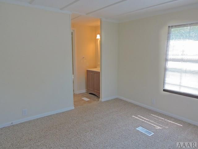 119 Bryan Road Knotts Island, NC 27950 - Photo 23 of 40 Master Bedroom