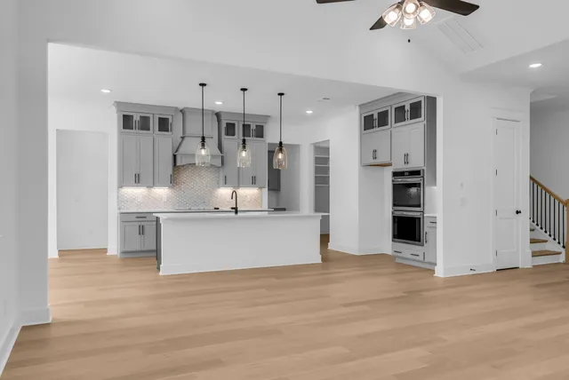 a view of an empty walk in closet