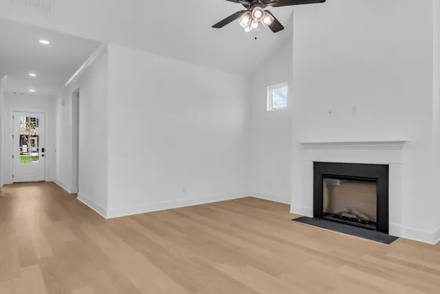 a bathroom with double sink and a mirror