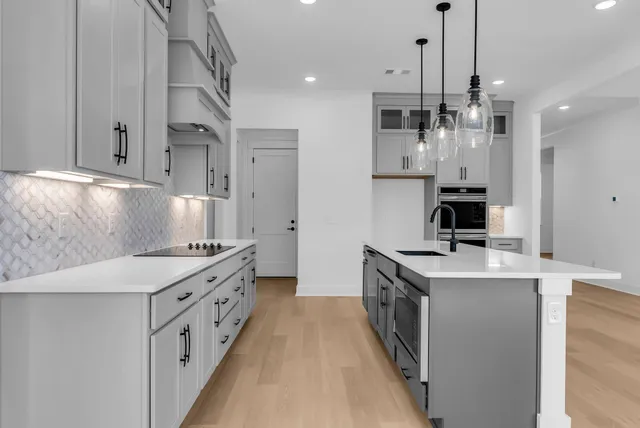 a white bath tub sitting in a bathroom