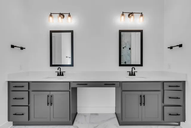 a bathroom with a sink toilet a shower and a mirror