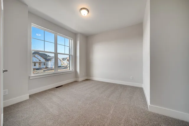 an empty room with a window