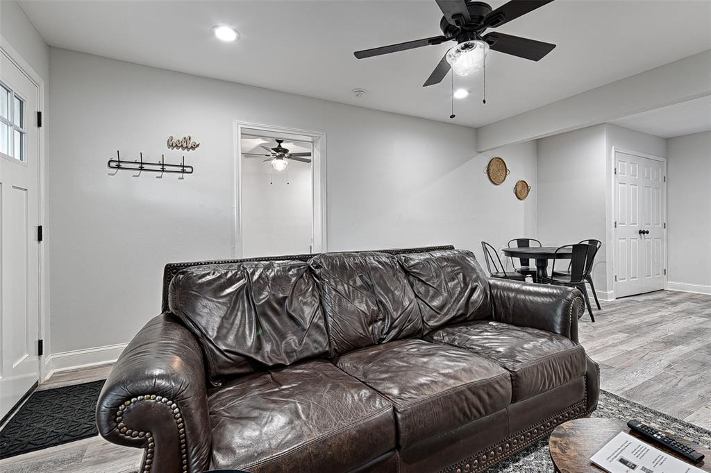1201 Ridgewood Road Denison, TX 75020 - Photo 14 of 29 Living room with light hardwood / wood-style floors and ceiling fan