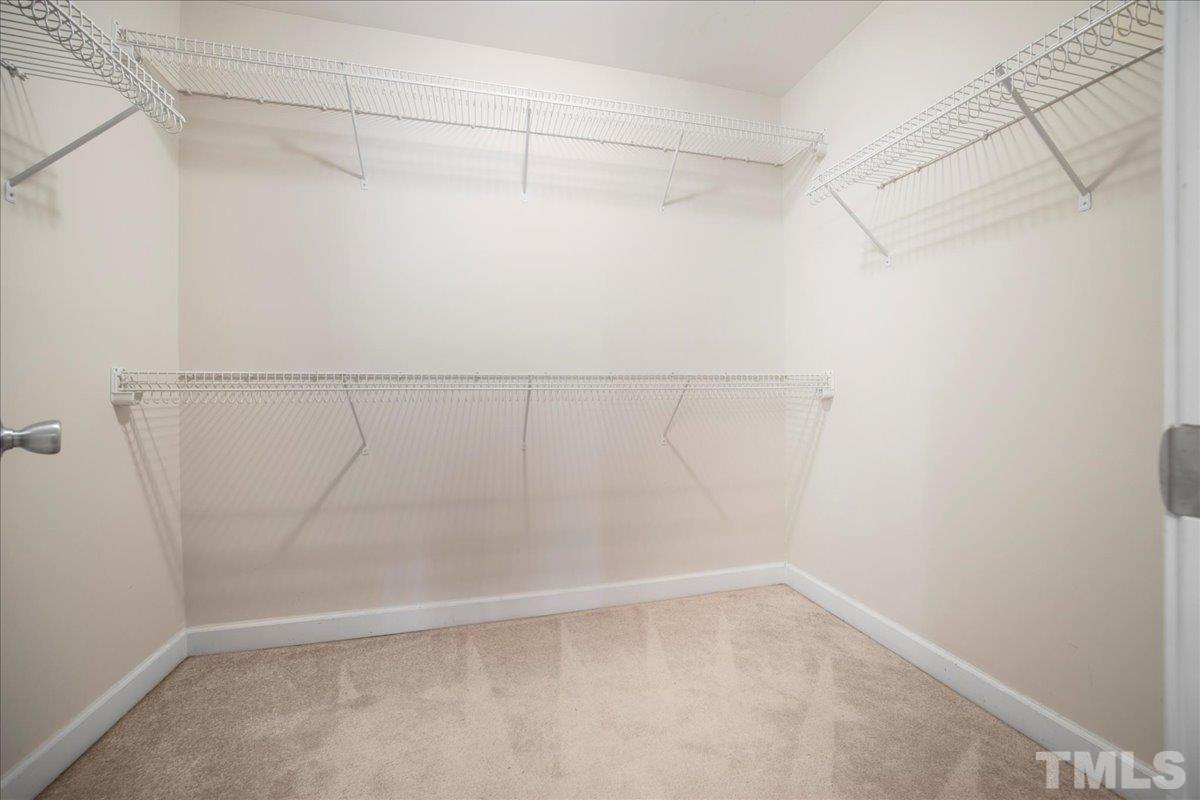 716 Saratoga Drive Durham, NC 27704 - Photo 18 of 30 a view of a room with racks on the wall