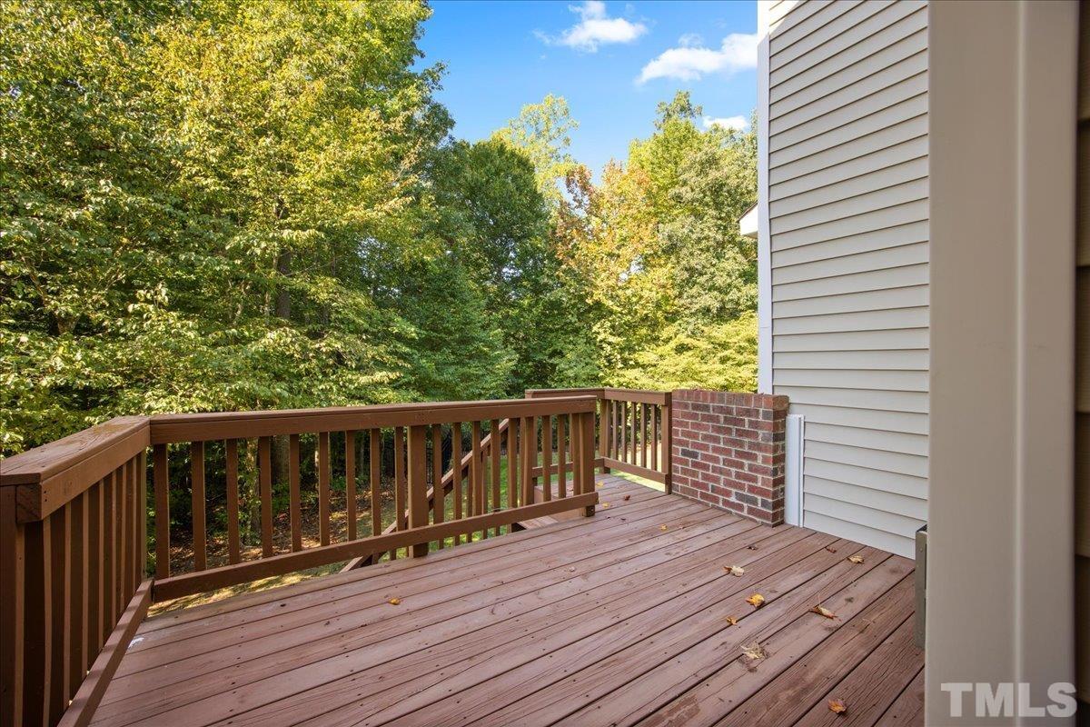 716 Saratoga Drive Durham, NC 27704 - Photo 26 of 30 a balcony with wooden floor