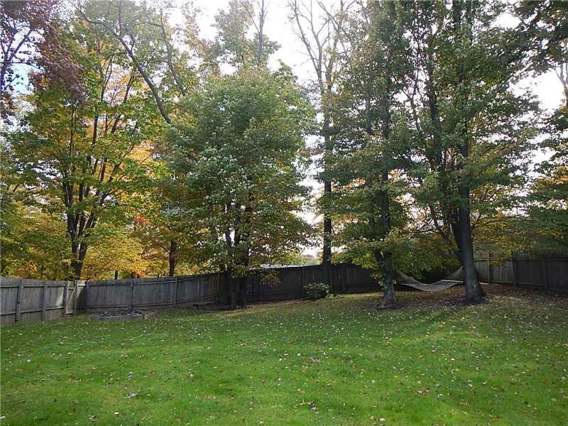 275 Boy Scout Road Evans City, PA 16033 - Photo 5 of 25 Yard/Garden. Spacious, fenced in yard. Come relax in the hammock or sit around the fire pit!