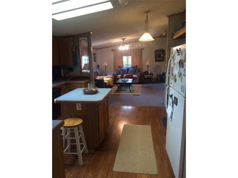 275 Boy Scout Road Evans City, PA 16033 - Photo 8 of 25 Kitchen. The kitchen features skylights and is open to the living room.