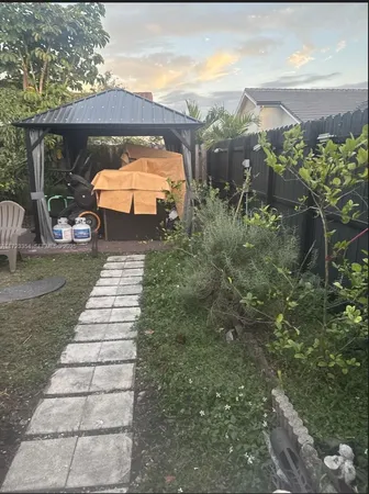 a view of a yard with an outdoor space