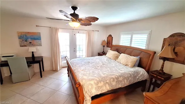 a view of backyard with palm trees