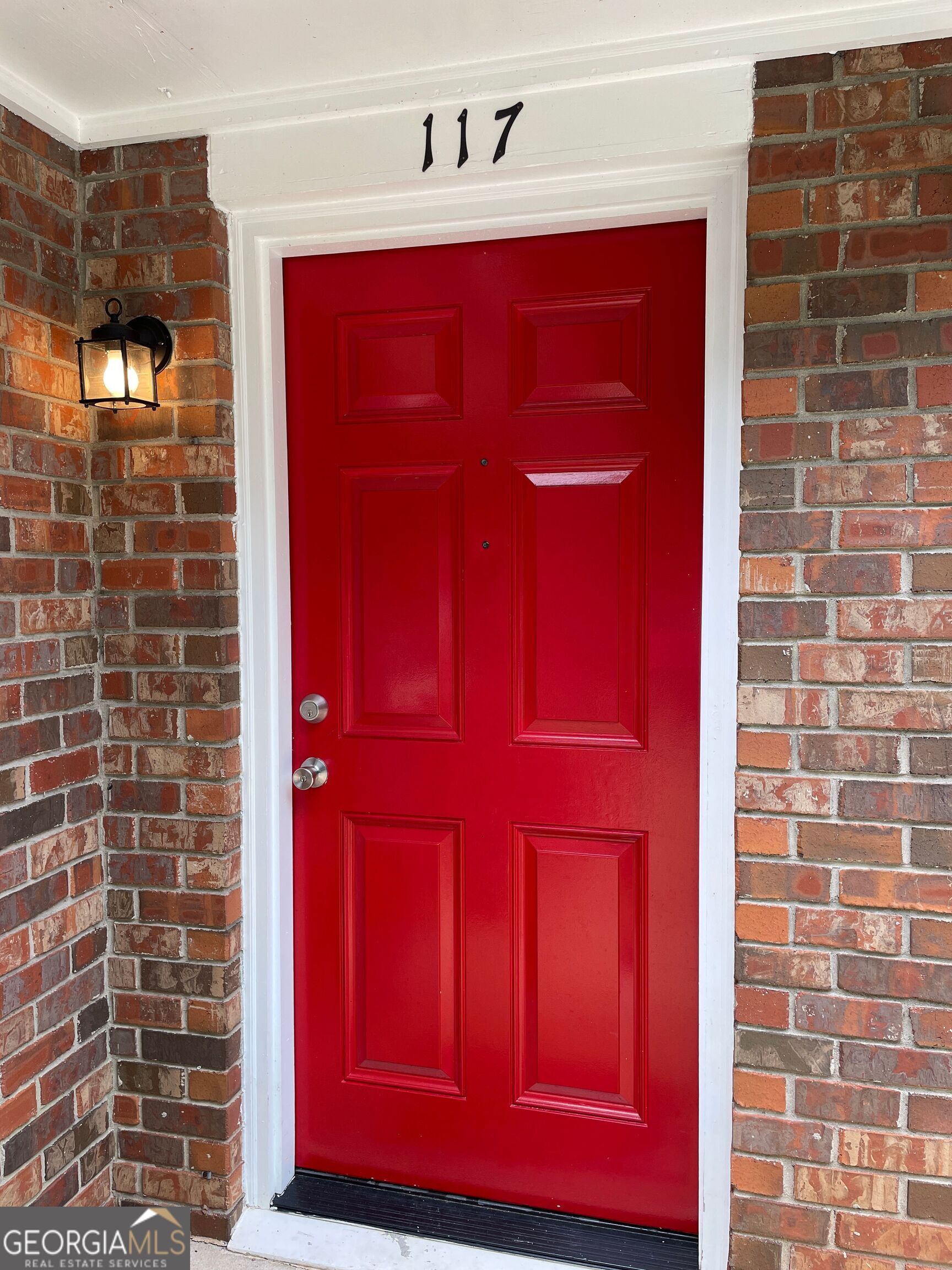a view of a red door of the house
