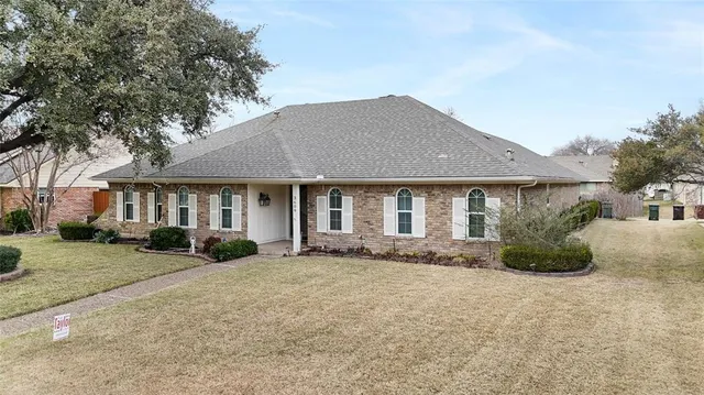 a view of empty room with a fireplace