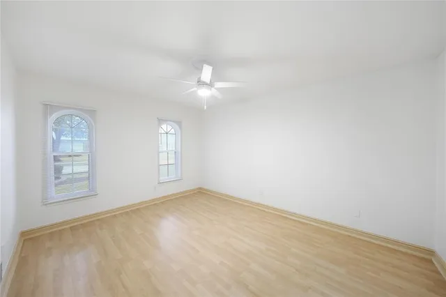 a bathroom with a sink a mirror and a bathtub