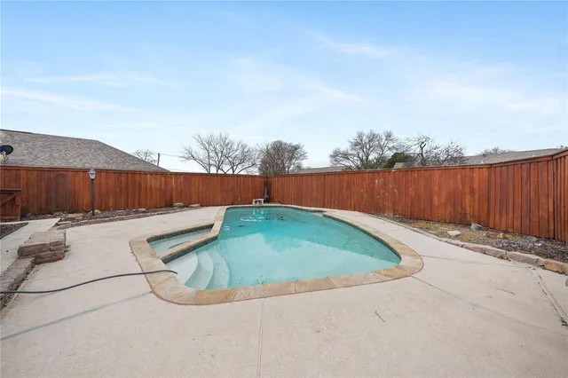 a house view with a backyard space