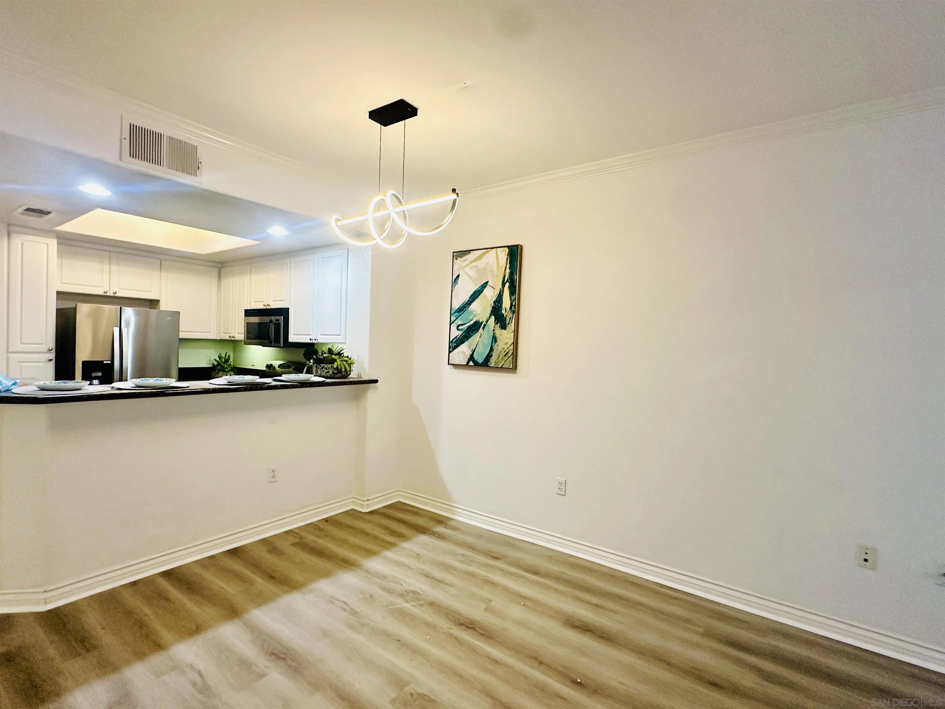 9263 Regents Road, Unit B204 La Jolla, CA 92037 - Photo 7 of 17 a view of a kitchen and a window