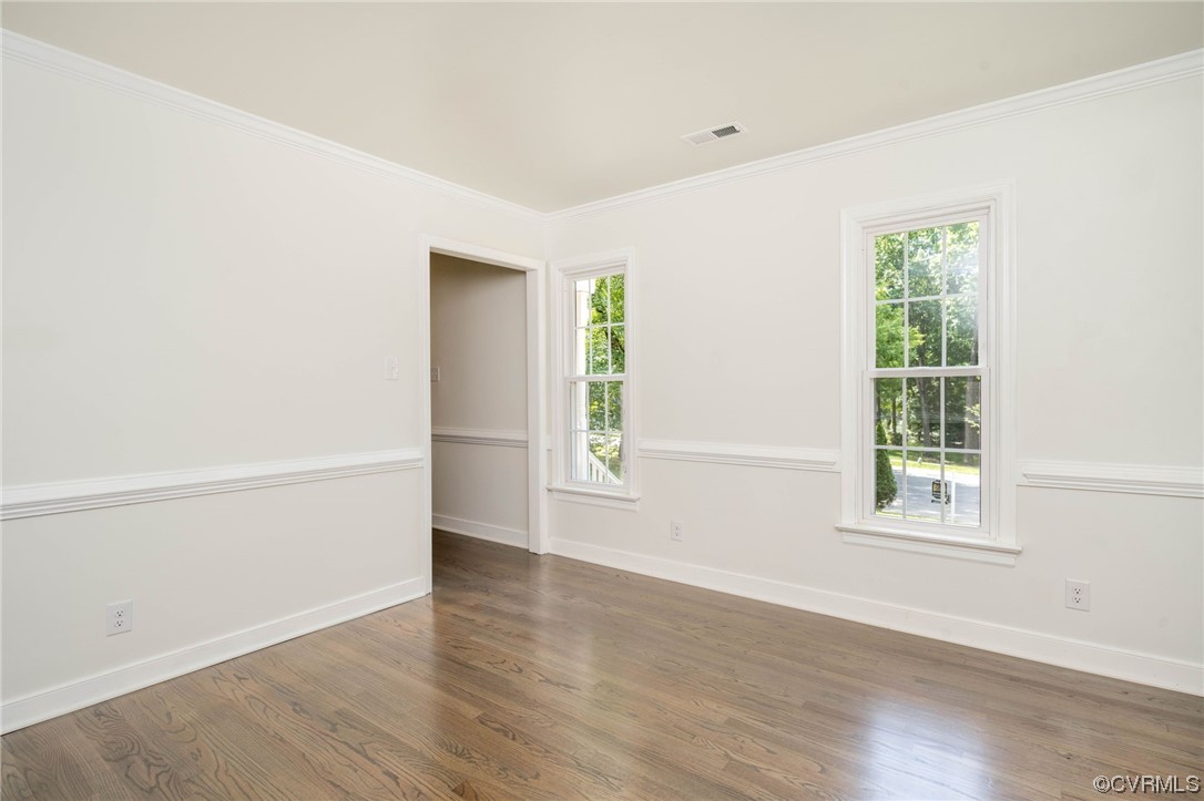 5801 Gates Mill Court Midlothian, VA 23112 - Photo 6 of 42 an empty room with wooden floor and windows