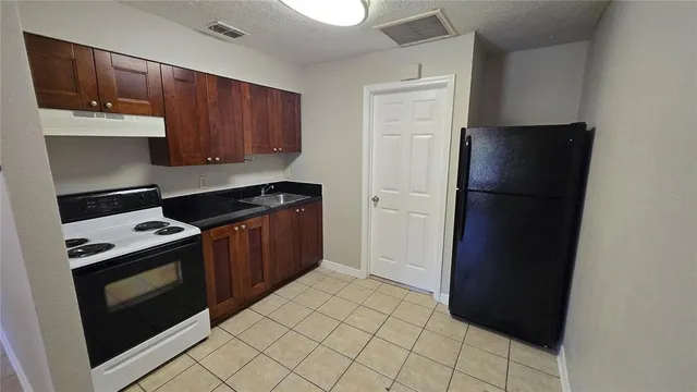 $1,000 | 11727 North 12th Street, Unit 5, Tampa, FL 33612