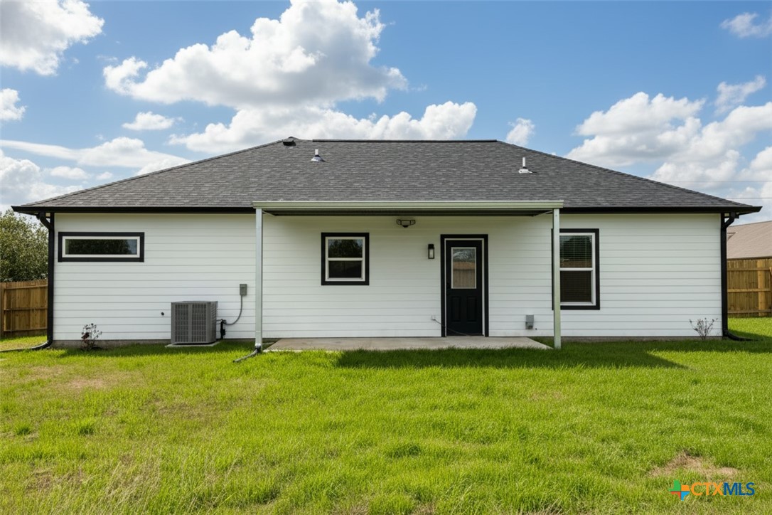 205 Haller Street Yoakum, TX 77995 - Photo 12 of 12 a house view with a garden space