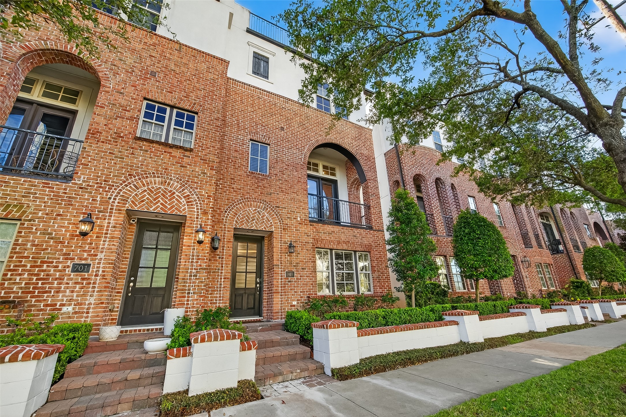 705 Delano Street Houston, TX 77003 - Photo 2 of 47 a front view of a house with garden