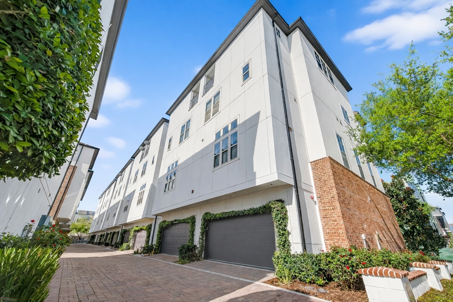 705 Delano Street Houston, TX 77003 - Photo 4 of 47 a view of a building with a yard